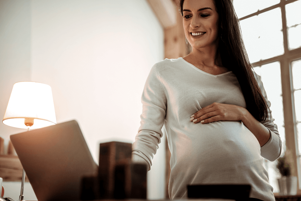 Pregnant Mother Researching DNA Testing